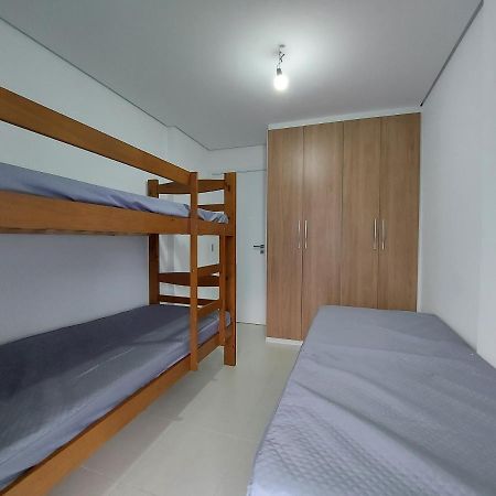 Apartamento perto da praia no Indaiá Bertioga Exterior foto
